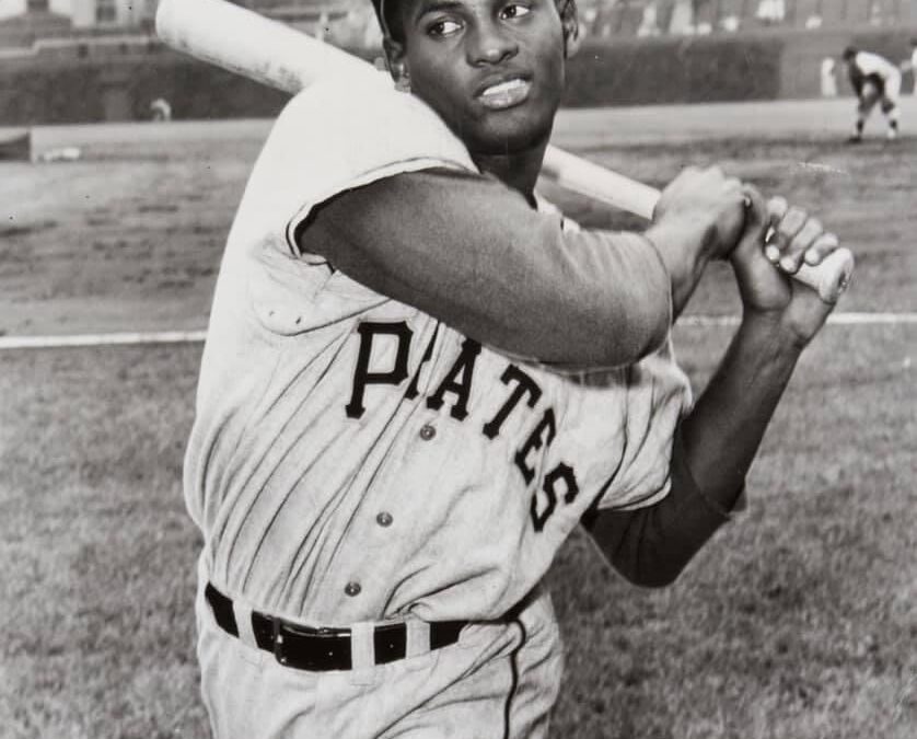 Pittsburgh Pirates right fielder Roberto Clemente injures left shoulder