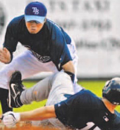 The benches clear in a rare spring training brawl when Shelley Duncan spikes Rays infielder Akinori Iwamura